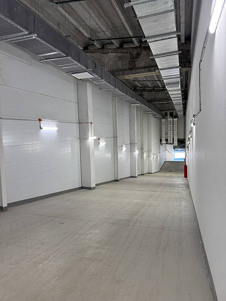 istock Internal loading ramp. Multi-level Inclined plane. Vehicle down- ramp for industrial use. Large storehouse, logistic. Industrial unit 2248412219