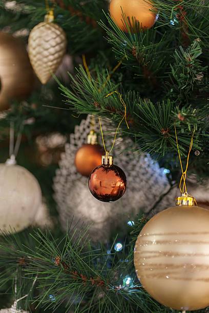 istock Beautifully decorated Christmas tree with colorful ornaments and soft lights displayed indoors during the holiday season 2248414542