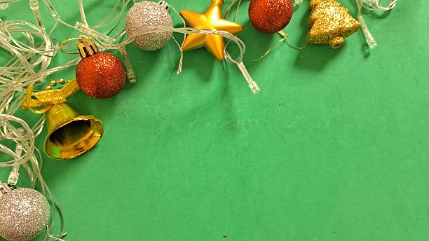 istock Festive Christmas Decorations on Green Background with Copy Space 2248414589