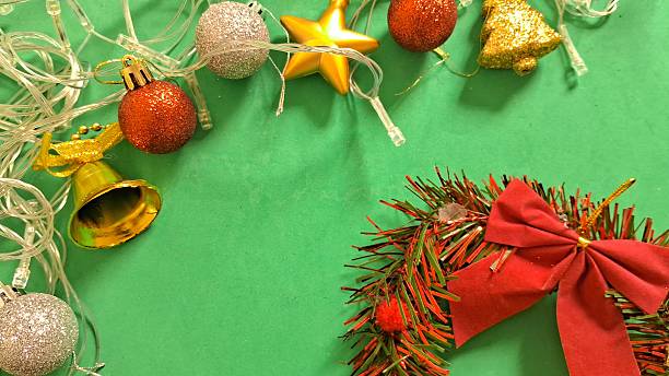 istock Festive Christmas Decorations on Green Background with Copy Space 2248414603