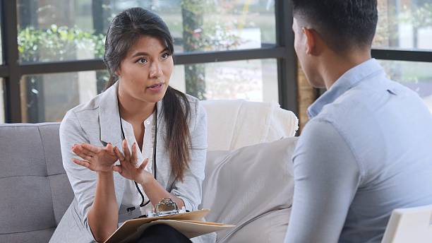 istock Professional mental health professional offering support and advice during a counseling session. 2248416013
