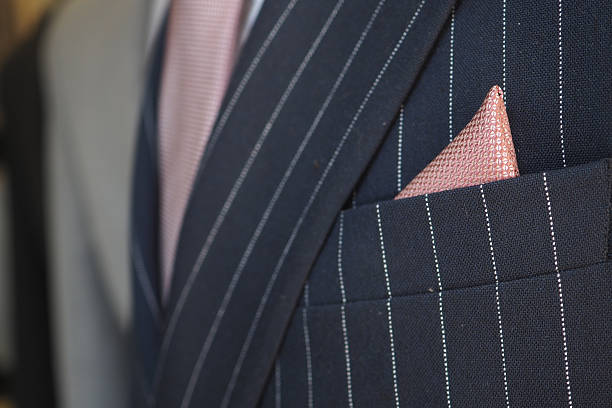 istock Elegant suit with pink pocket square on display 2248418138