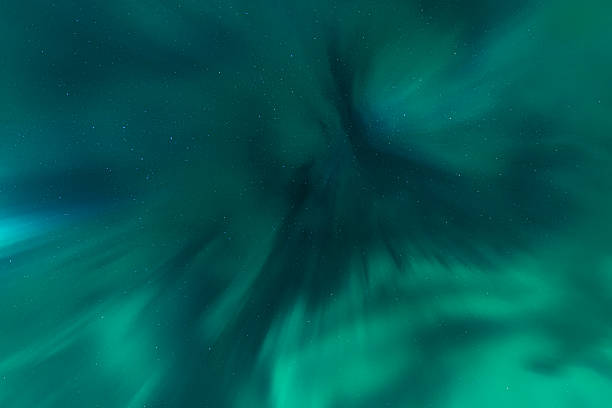 istock Aurora Borealis dancing vibrant green lights in Sweden sky 2248418887