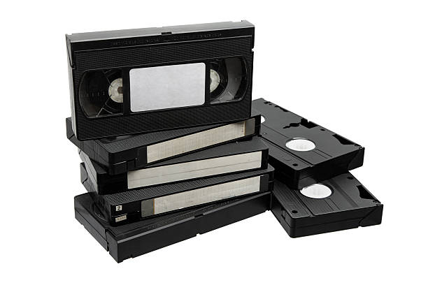 istock A stack and pile of retro black VHS video cassette tapes, isolated on white. 2248419220