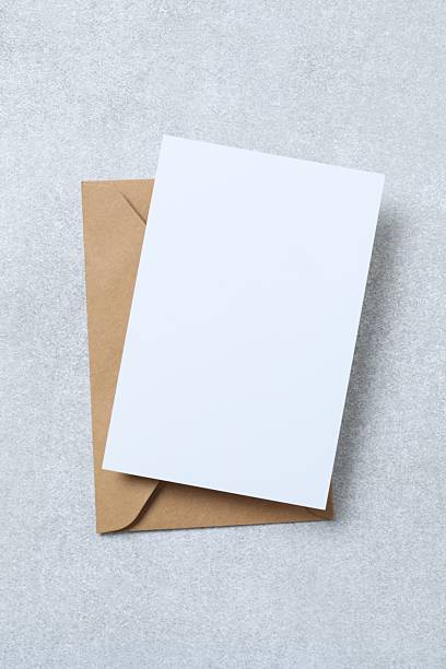 istock Clipboard with white card on grey background. Top view. Mock up. 2248421011