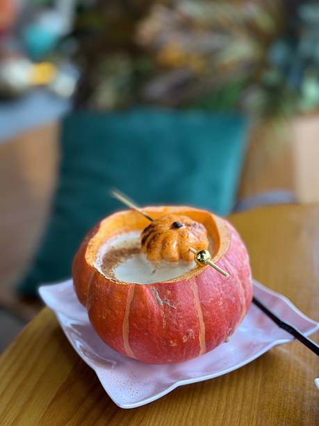 Pumpkin Latte in Festive Autumn Setting