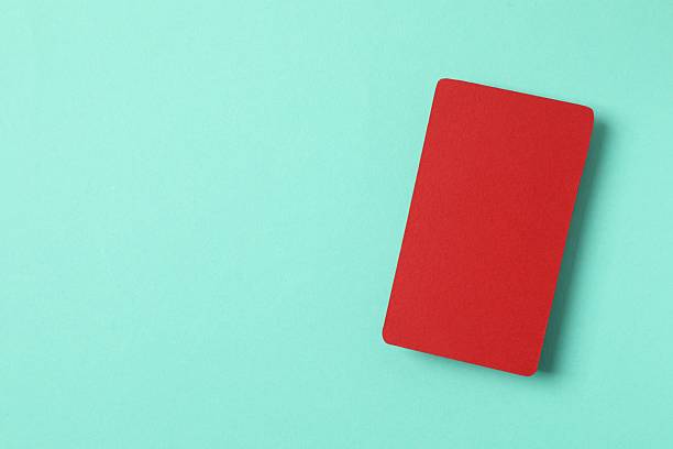 istock Red paper card on color background 2248423486