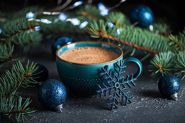 istock Teal Mug with Hot Chocolate and Snowflake Ornament in Festive Christmas Setting 2248423589
