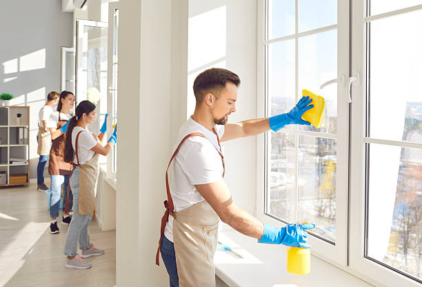 istock Man From Cleaning Service Staff Wiping Window 2248423924