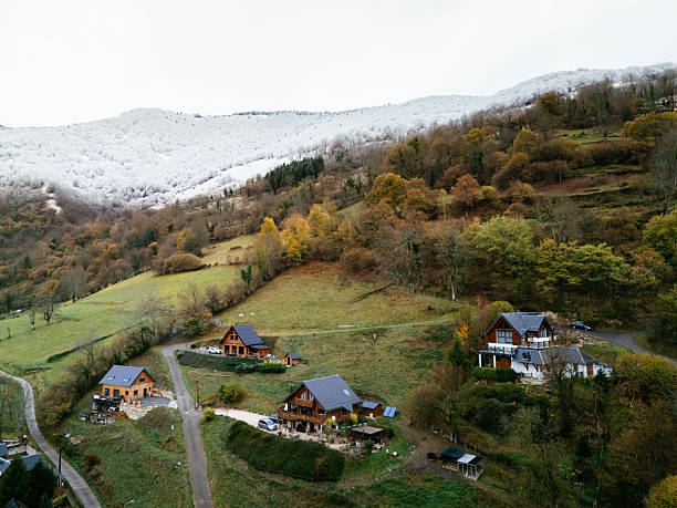 Wooden huts in a mountain area. Aerial view.