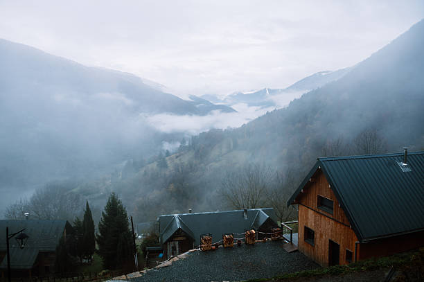 A mountain valley with fog. Luchon valley, France.