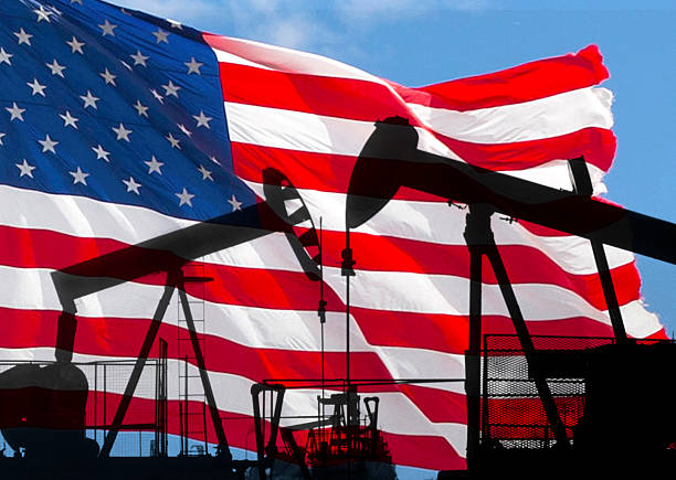 istock Oil pump and USA  American fla 2248425187