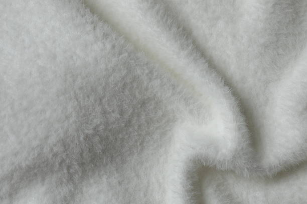 istock Beautiful white cashmere fabric background. Top view 2248426372