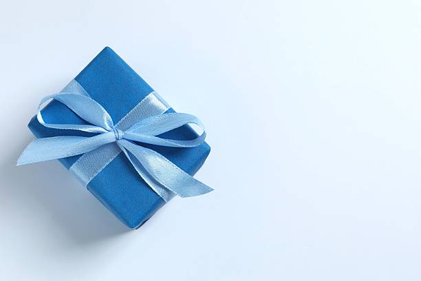 istock Beautiful gift box with blue robbon on white background 2248426418