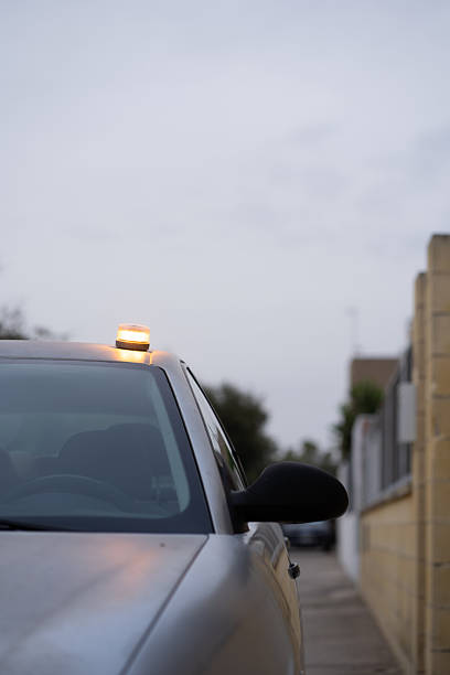 istock Car breakdown with v-16 beacon light flashing, emergency led signal 2248430722