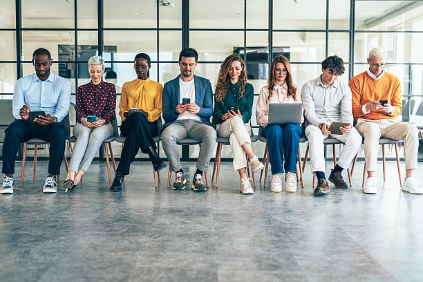 istock Diverse Group of Professionals in a Modern Office Setting 2248436622