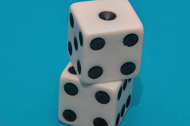 Pair of die dice game metaphor life unpredictability chance entertainment isolated ten dots on white backgrounds