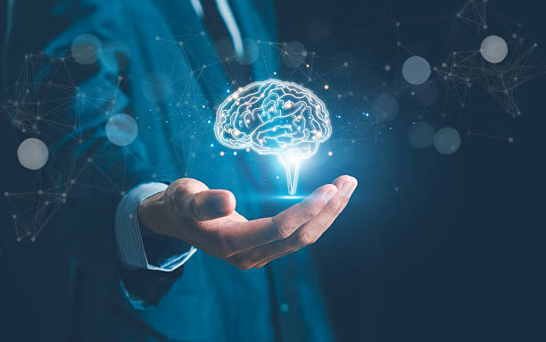 istock Brain inside the hands of the businessman. Human head and brain.Deep learning , Machine learning and artificial intelligence , AI Technology, thinking concept.The concept of the business idea. 2248445900