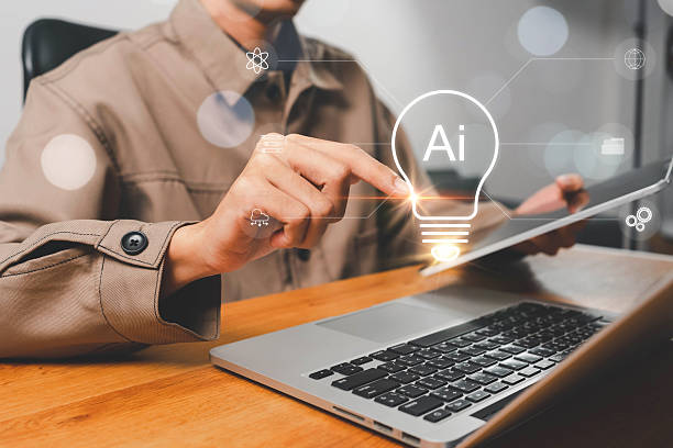 istock AI or Artificial intelligence concept. Man is holding a bright light bulb and has an AI chip and gears inside. future digital technology, Intelligent machine robot, Data science, Futuristic knowledge 2248446090
