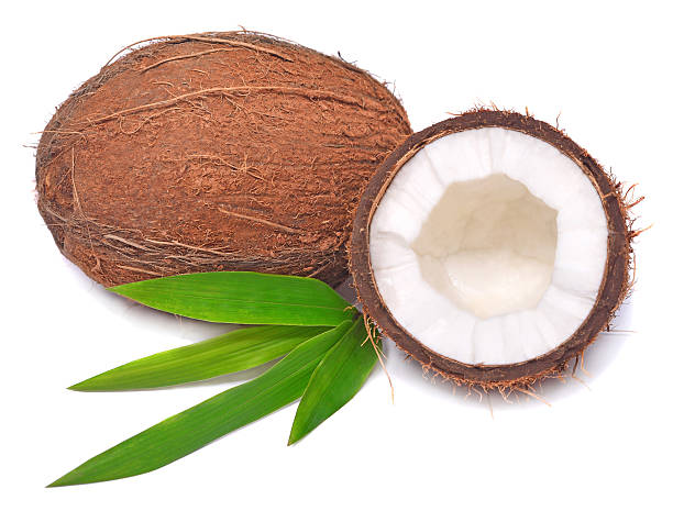 istock Coconuts whole and half with leaf isolated on white background. Tropical fruit 2248449209