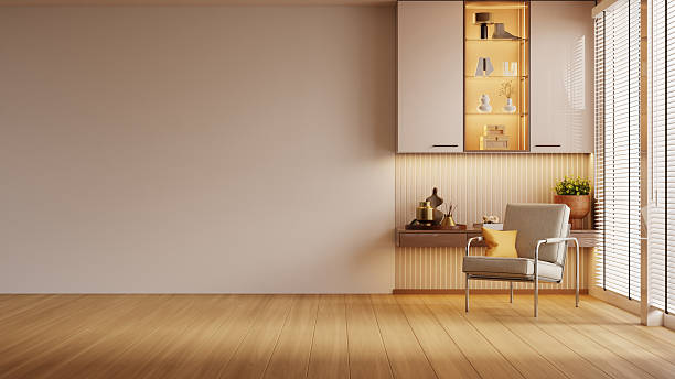 istock A modern cozy reading corner featuring a comfortable armchair, warm built-in cabinet lighting, decorative vases, plants, and wooden flooring- 3D rendering 2248461799
