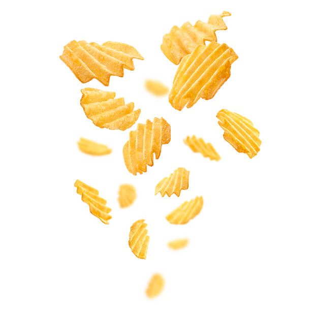 istock Fluted potato chips levitate on a white background 2248464216
