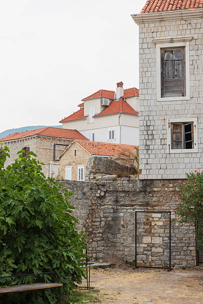 istock A tranquil coastal town scene featuring stone houses with red-tiled roofs. Budva 2248466935