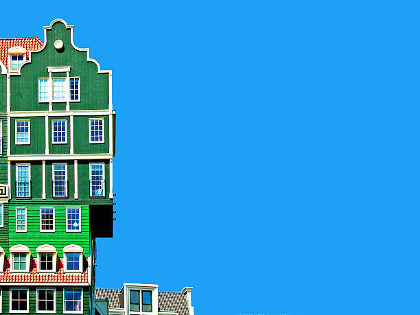 Unique architecture in the center of Zaandam, Netherlands, with buildings inspired by traditional Dutch houses and vivid colors under a cloudy sky.