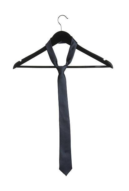 istock Hanger with dark necktie isolated on white 2248469289