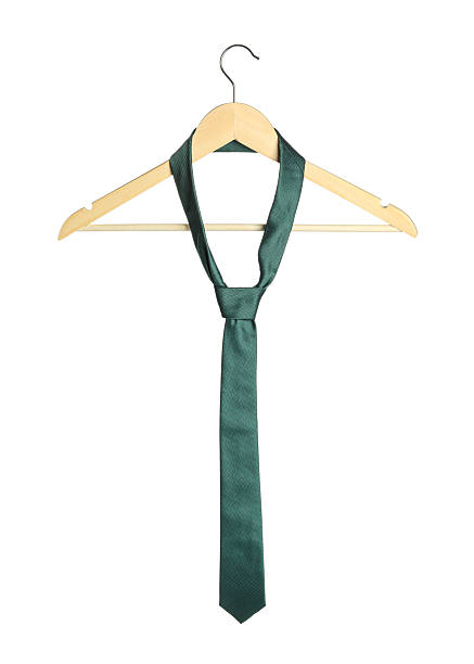istock Hanger with green necktie isolated on white 2248469401