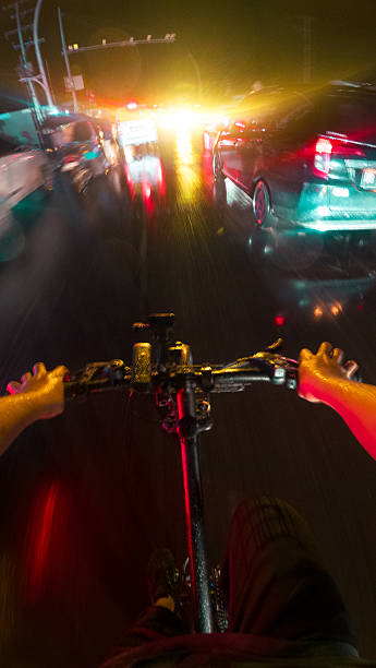 istock Point of View of Biker Riding at Night 2248469430