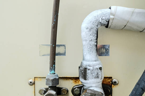 istock Buildup of water condensation on old rusty refrigerant suction line pipe 2248473104