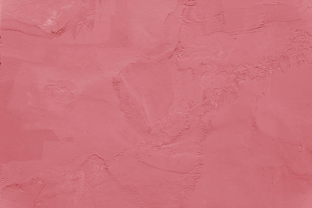 istock Rough traces of pink plaster on the wall. 2248473974