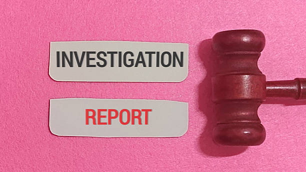 istock Demand justice with an investigation report from the court system using a striking gavel on a vibrant pink surface 2248477728