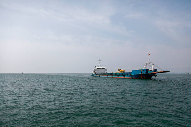 istock Large ship sailing on the vast sea under a clear sky 2248479783