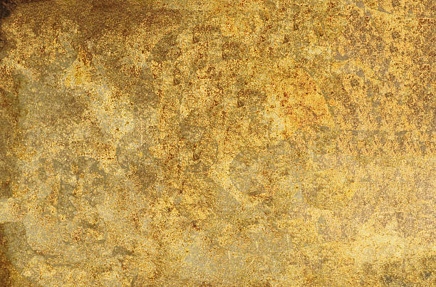 istock Gold textured background showing rough surface with stains 2248484629