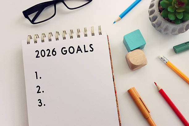 istock Top view image of white paper background with the text goals 2026 2248485846