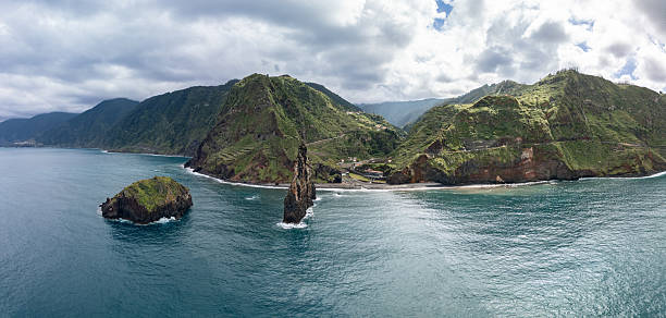 istock Panoramic drone view of Ilheus da Ribeira da Janela Madeira with cliffs and ocean waves 2248487050