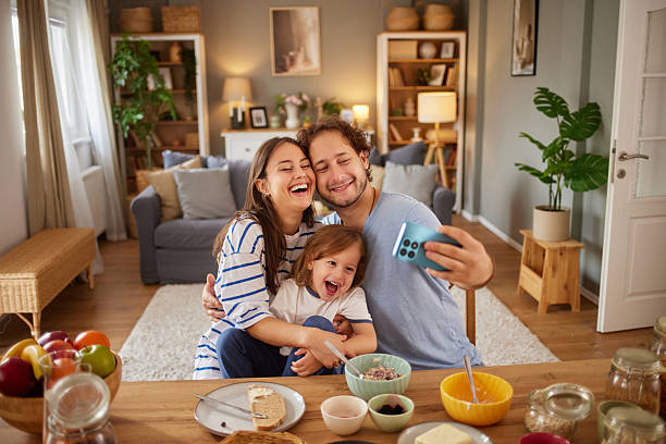 istock Family taking selfie together during breakfast at home 2248490528