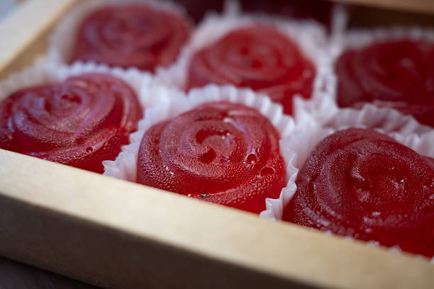Roses and chocolates closeup on marble background, valentine's day