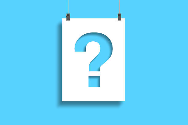 istock Question mark on paper hanging with rope on blue background 2248501376