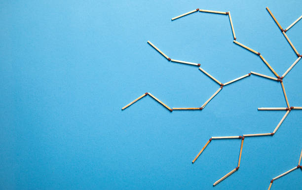 Global network connection made by match on the blue background.