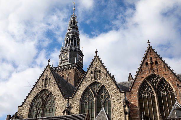 istock Amsterdam Oude Kerk and a blue cloudy sky 2248508692