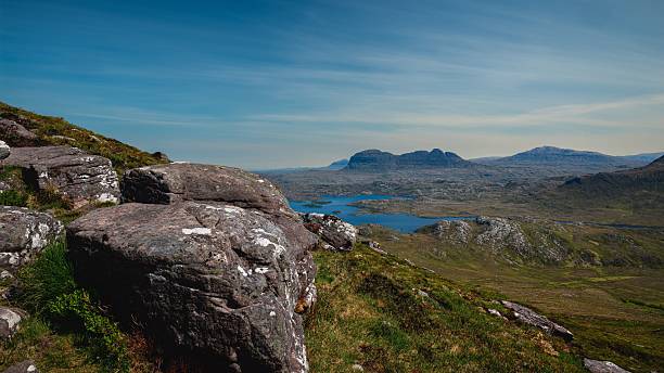 istock Rocky landscape with distant mountains in Scotland. 2248511385
