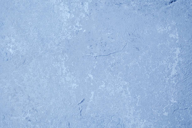 istock Grunge blue wall with textured plaster and worn vintage finish 2248526158