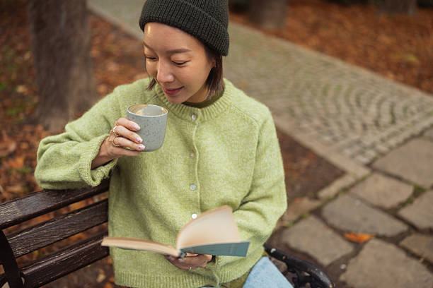 istock Cozy Autumn Moment With Coffee and a Book 2248527306