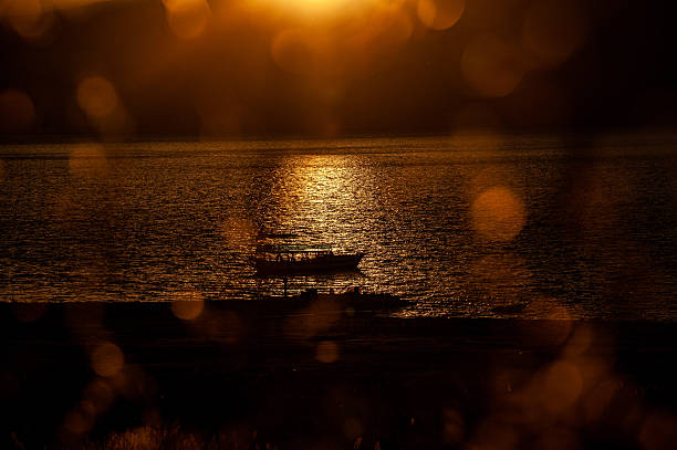 A fishing boat on Lake Burdur at sunset