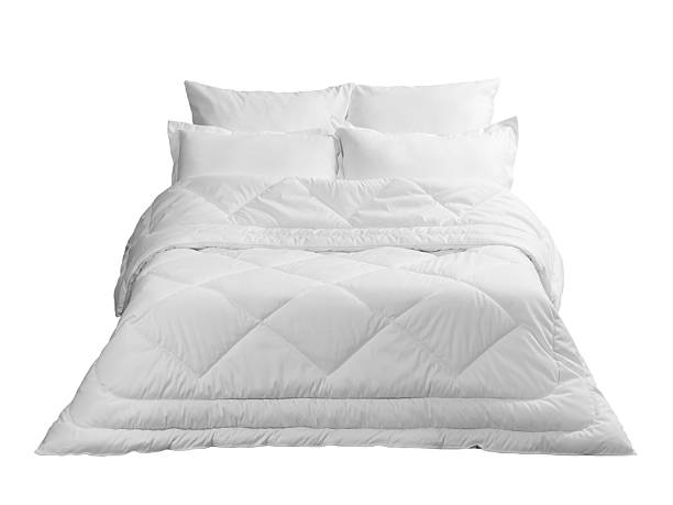 istock a bed with white pillows and a blanket, a mock-up for a bedroom design, isolated 2248530638