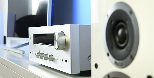 Stylish audio setup featuring a receiver and speakers in living space.