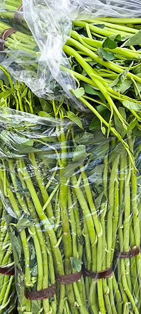 istock Thai morning glory at a fresh vegetable wholesaler. 2248536404